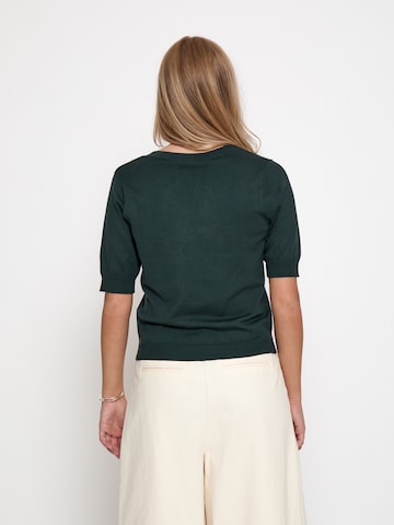 Top 'Milla' di minus in verde