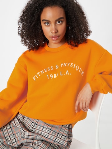 Gina Tricot Sweatshirt 'Riley' in Orange