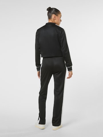 regular Pantaloni 'SAGANO straight taped track pants' di FILA in nero