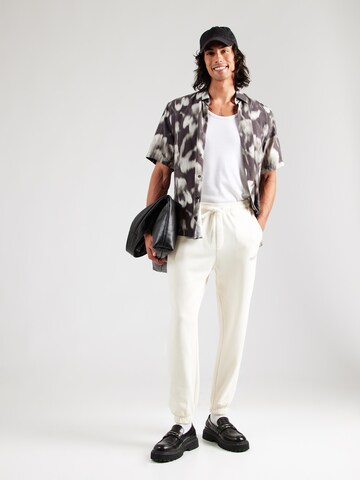 JACK & JONES Конический (Tapered) Штаны 'JPSTKANE BILLY' в Белый