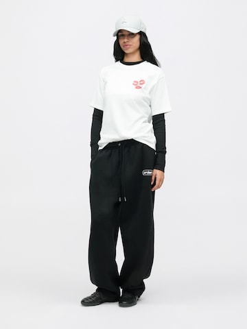 Jordan Baggy Housut 'FLT FLC' värissä musta