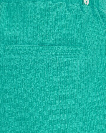 Pantaloni de la WE Fashion pe verde