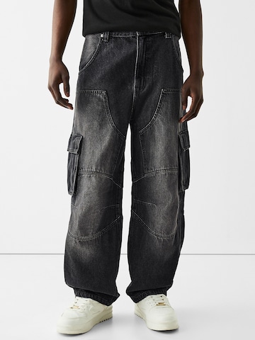 Loosefit Jeans cargo di Bershka in nero