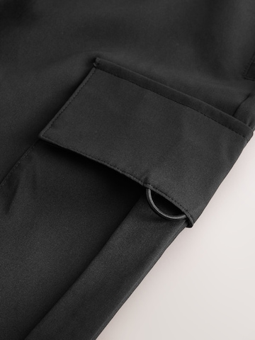 Slimfit Pantaloni funzionali di Next in nero
