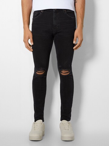 Bershka Skinny Jeans in Black: front