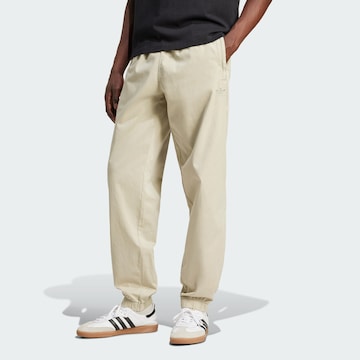 ADIDAS ORIGINALS Tapered Broek in Beige: voorkant