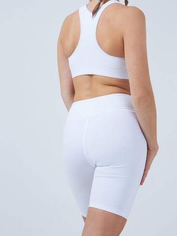 Coupe slim Pantalon de sport SPORTKIND en blanc