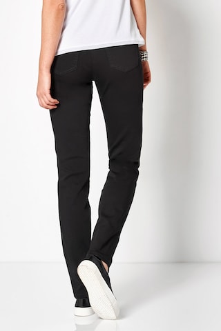 TONI Slim fit Trousers 'To Be Loved' in Black