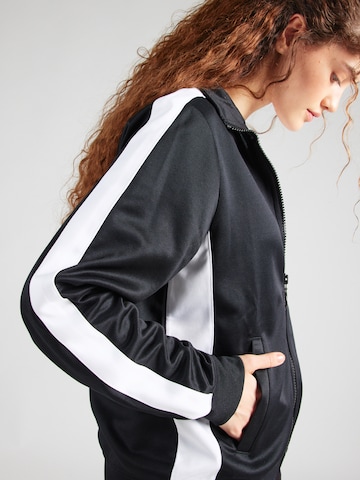 Nike Sportswear - Sudadera con cremallera en negro