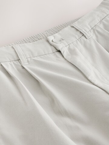 Next Loose fit Pleat-front trousers in Beige