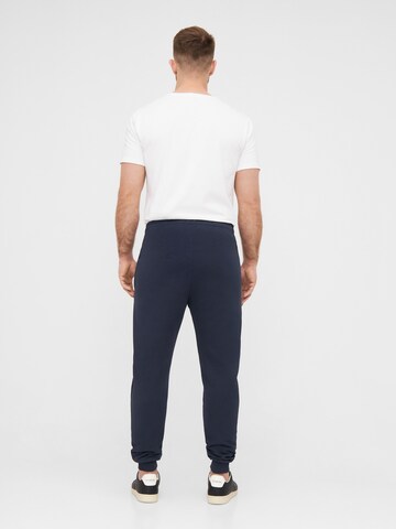 NIKIN Tapered Trousers 'Tree' in Blue