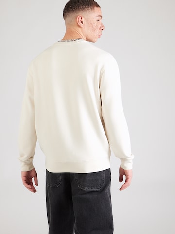 GUESS Μπλούζα φούτερ σε μπεζ