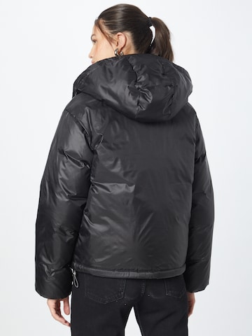 LEVI'S ® Winter Jacket 'Luna Core Puffer Short' in Black