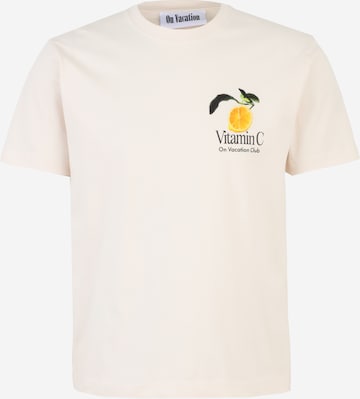 T-Shirt 'Vitamin C' On Vacation en beige : devant