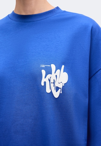 Karo Kauer T-Shirt in Blau