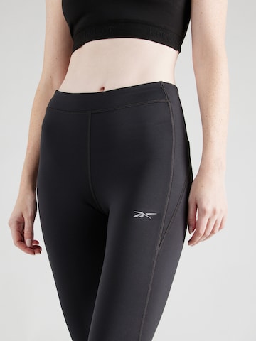 Reebok - Skinny Calças de desporto 'VECTOR' em preto