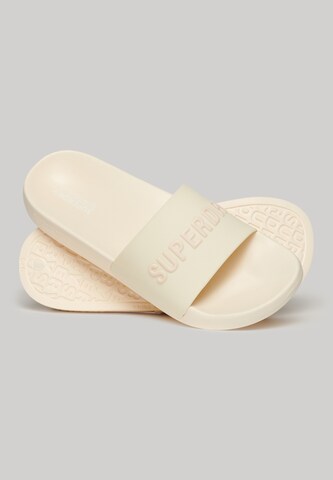 Claquettes / Tongs Superdry en blanc