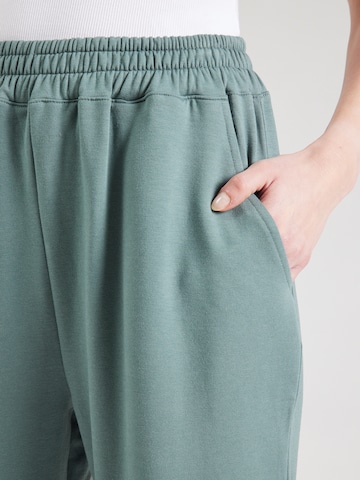 ABOUT YOU Tapered Pants 'Naomi' in Green