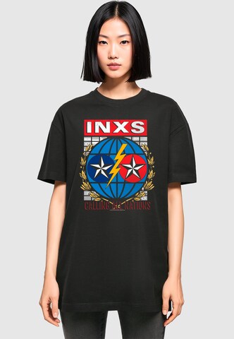 Merchcode T-Shirt 'INXS - Calling All Nations' in Schwarz: Vorderseite