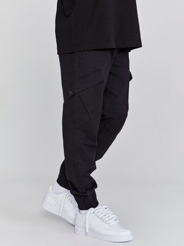 Tapered Pantaloni cargo di SikSilk in nero