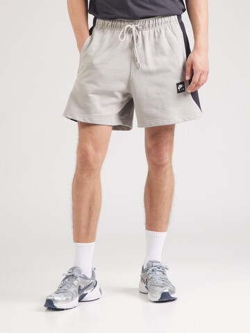 Nike Sportswear Loose fit Trousers in Grey: front