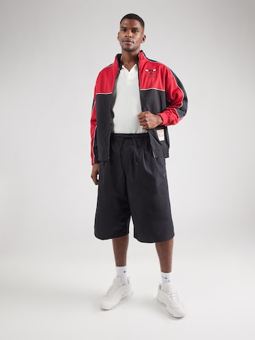Nike Sportswear Свободный крой Брюки со складками 'CLUB SEOUL' в Черный