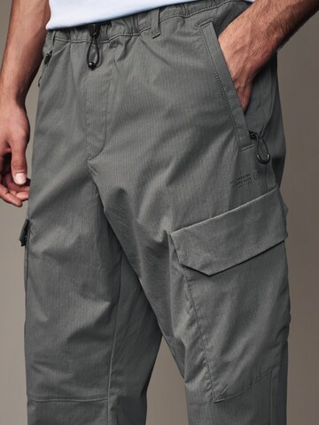 regular Pantaloni di Next in grigio