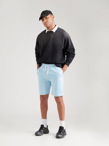 ELLESSE Štandardný strih Nohavice 'Niorir' - Modrá