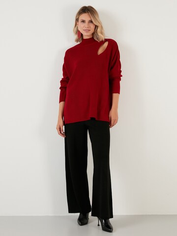 Pullover di LELA in rosso