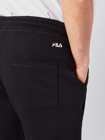 Tapered Pantaloni sport de la FILA pe negru