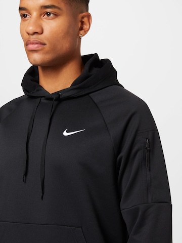 Hanorac sport de la NIKE pe negru