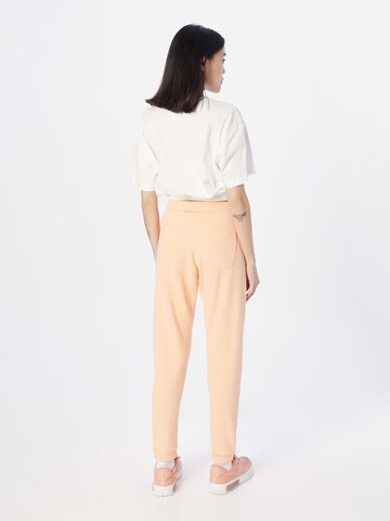 Champion Authentic Athletic Apparel Tapered Broek in Roze