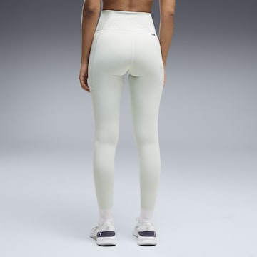 PUMA Skinny Sportbroek in Groen
