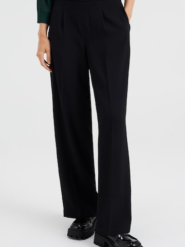 WE Fashion Regular Trousers with creases in Black: front