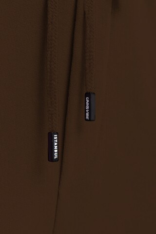 UNIQVIBE Tapered Trousers in Brown