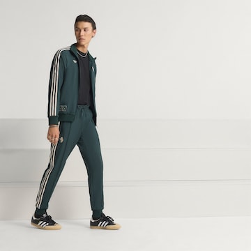ADIDAS ORIGINALS Tapered Broek in Groen
