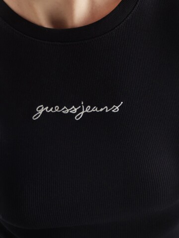 Maglietta di GUESS JEANS in nero