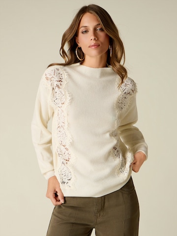 Pullover di oltre in beige