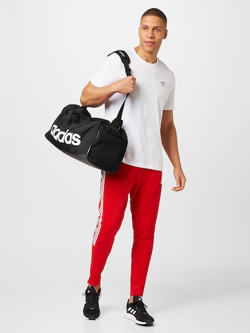 ADIDAS SPORTSWEAR - Slimfit Calças de desporto 'Tiro Suit-Up Lifestyle' em vermelho