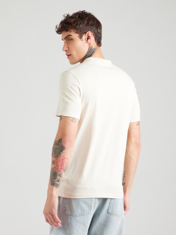 Maglietta di GUESS in beige