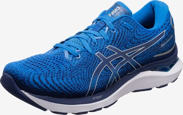 Chaussure de course ASICS en bleu : devant