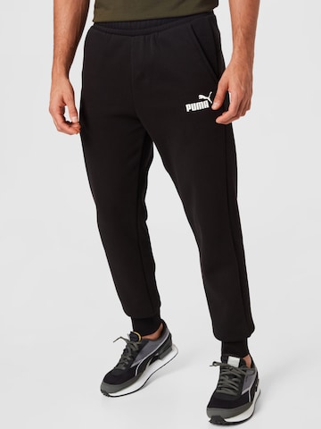 PUMA - Tapered Calças de desporto em preto: frente