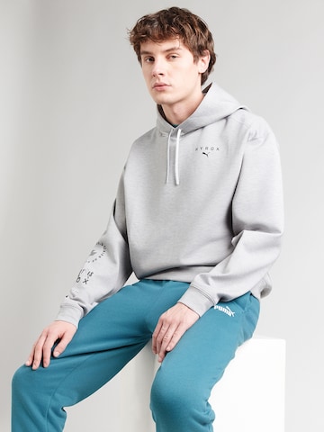 PUMA Bluzka sportowa 'PUMA X HYROX CLOUDSPUN' w kolorze szary: przód