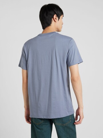 Tricou de la QUIKSILVER pe albastru