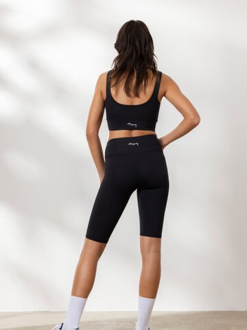 Bustino Reggiseno sportivo 'Bustier Unicolor' di Hey Honey in nero