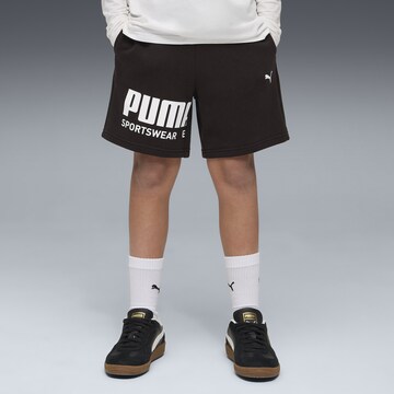 PUMA Wide leg Trousers in Black: front