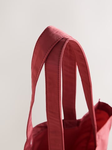 Shopper di Next in rosso