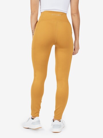 Skinny Pantaloni sportivi di Spyder in giallo