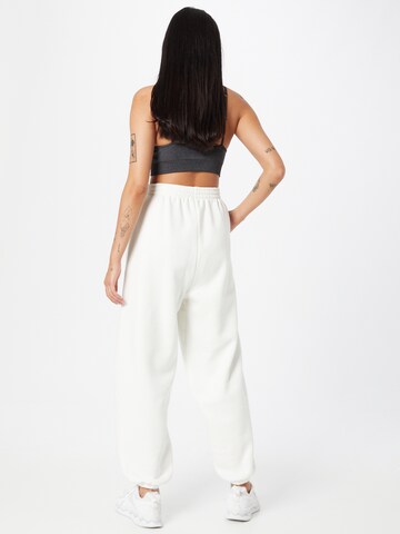Reebok Tapered Sports trousers in White