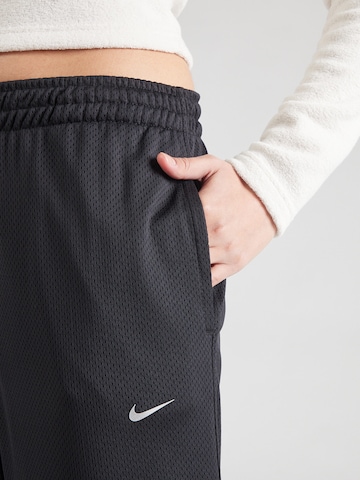 Nike SportswearWide Leg/ Široke nogavice Hlače - crna boja